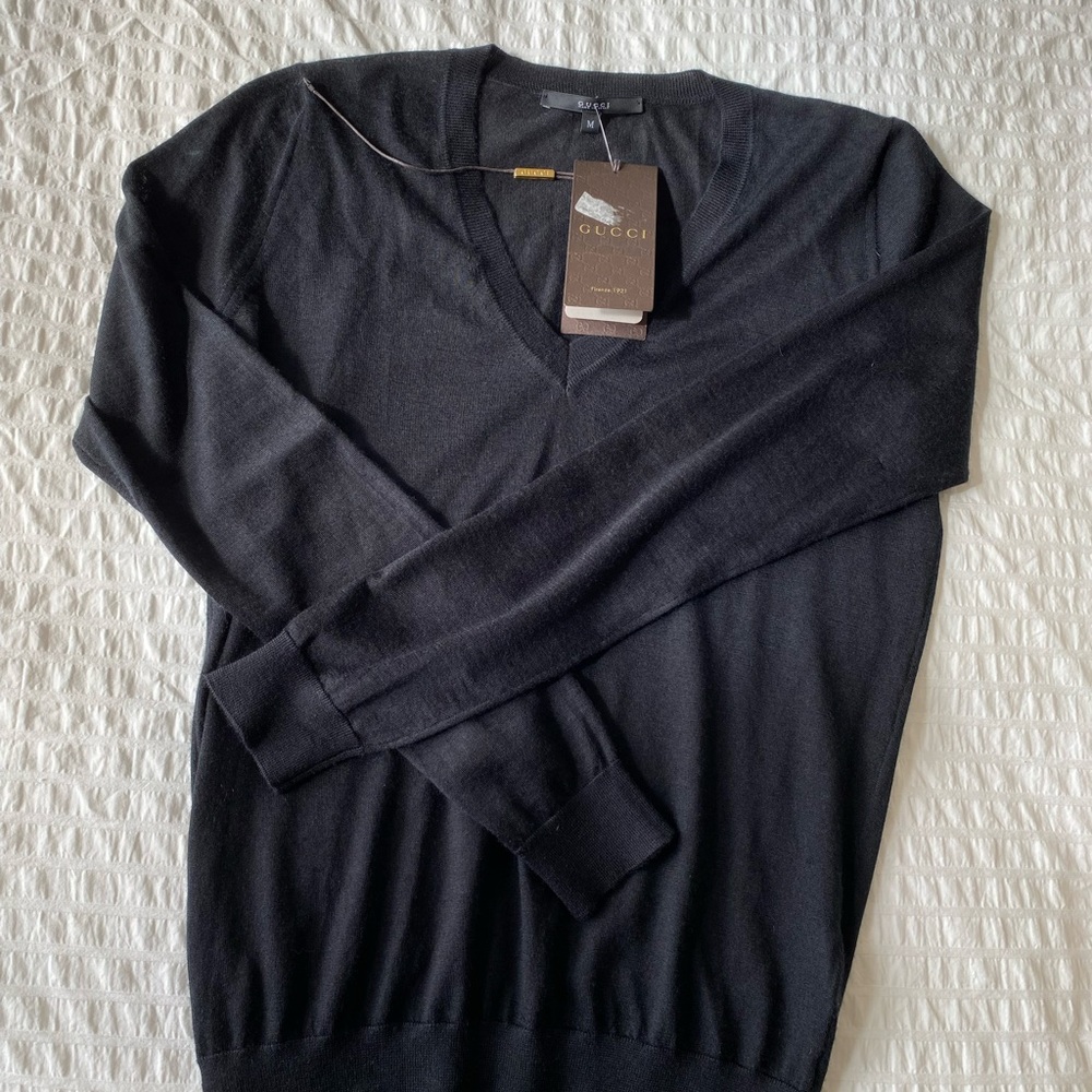 Cleaning my closet. Gucci black sweater size M. Brand new with tag.